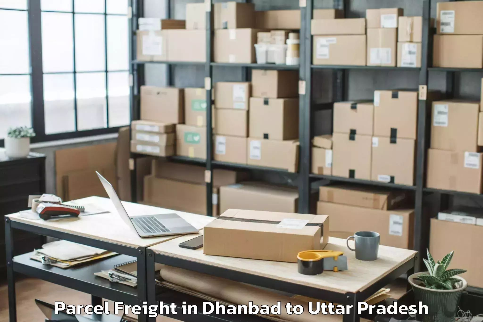 Top Dhanbad to Mariahu Parcel Freight Available